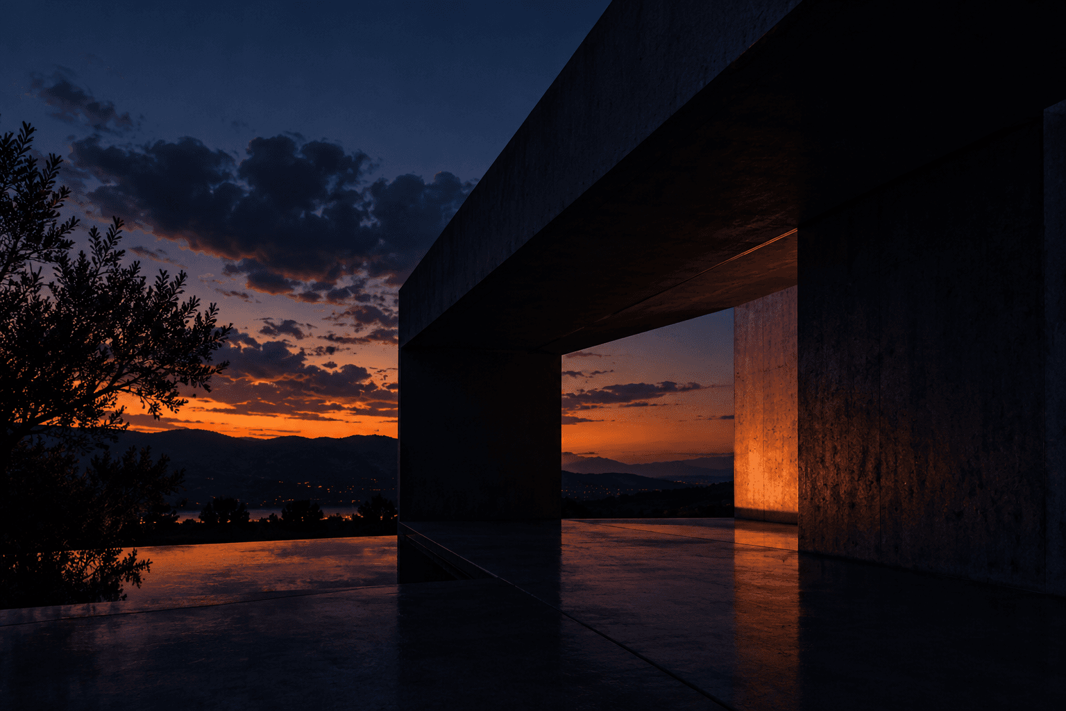 A concrete frame opening onto a sunset landscape